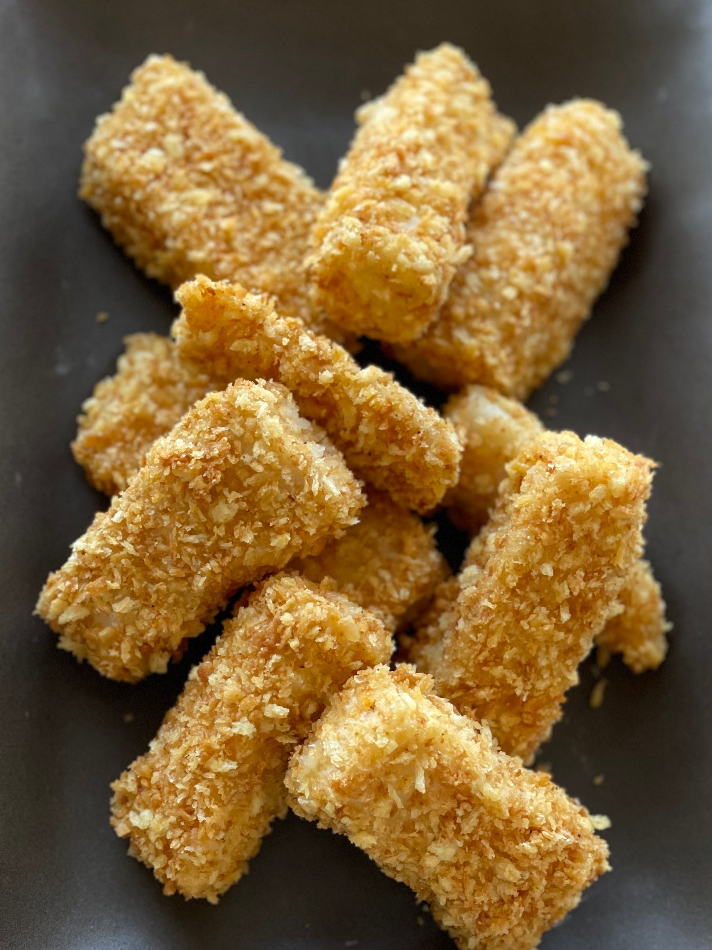 Iscas de peixe empanado no forno